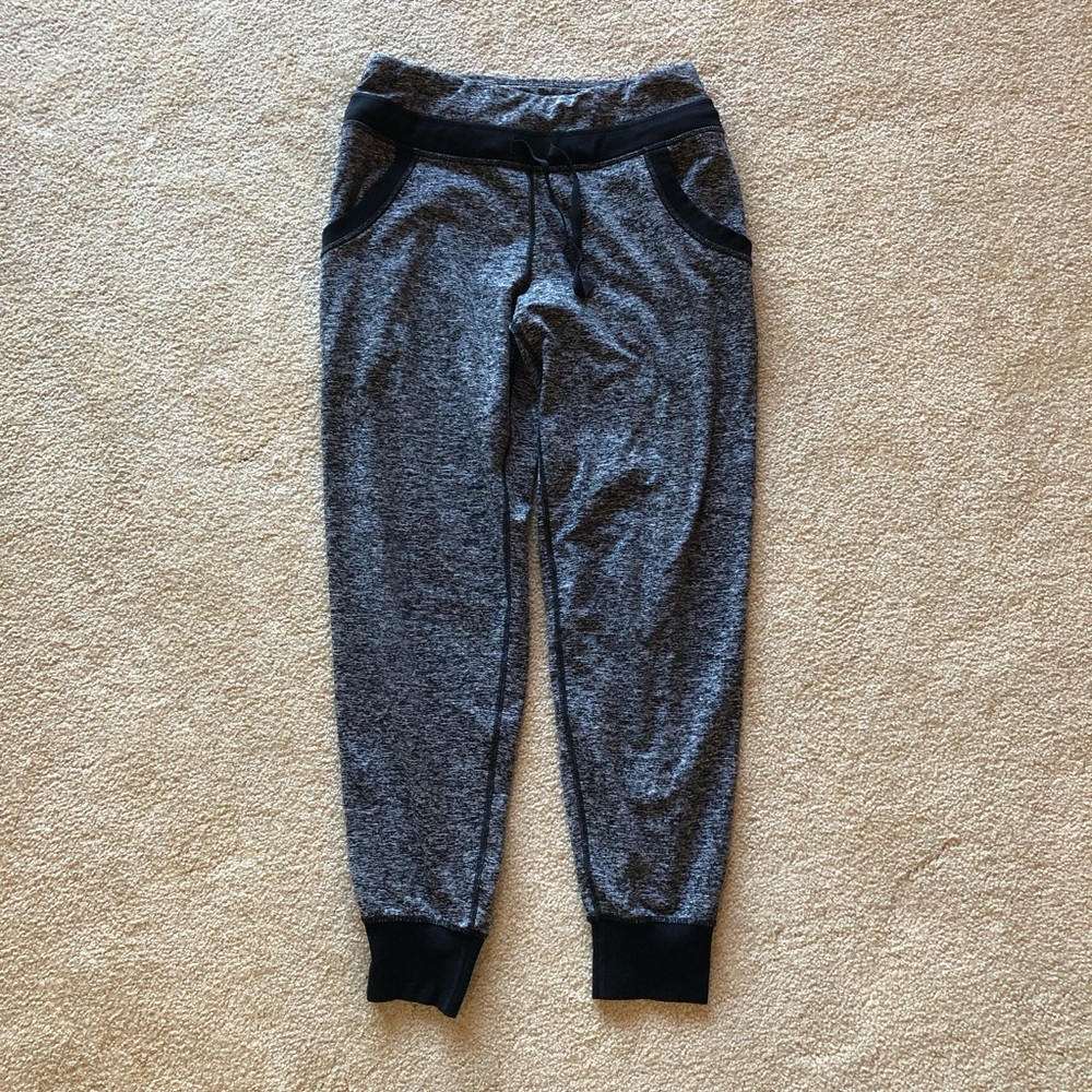 Marked black sweatpants